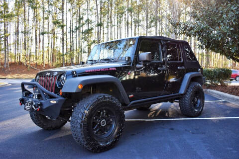 2012 Jeep Wrangler Unlimited for sale at Greystone Motors in Birmingham AL