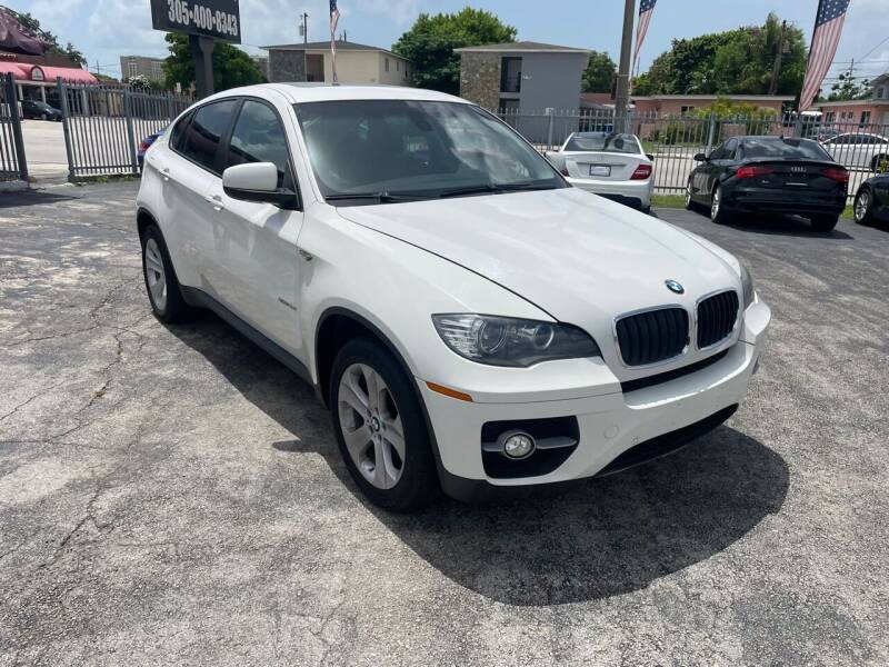 2012 BMW X6 for sale at THE SHOWROOM in Miami FL