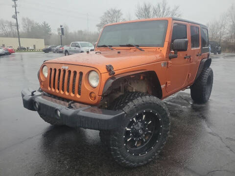 2011 Jeep Wrangler Unlimited for sale at Cruisin' Auto Sales in Madison IN