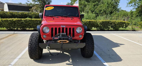 2014 Jeep Wrangler Unlimited for sale at Fabela's Auto Sales Inc. in Dickinson TX