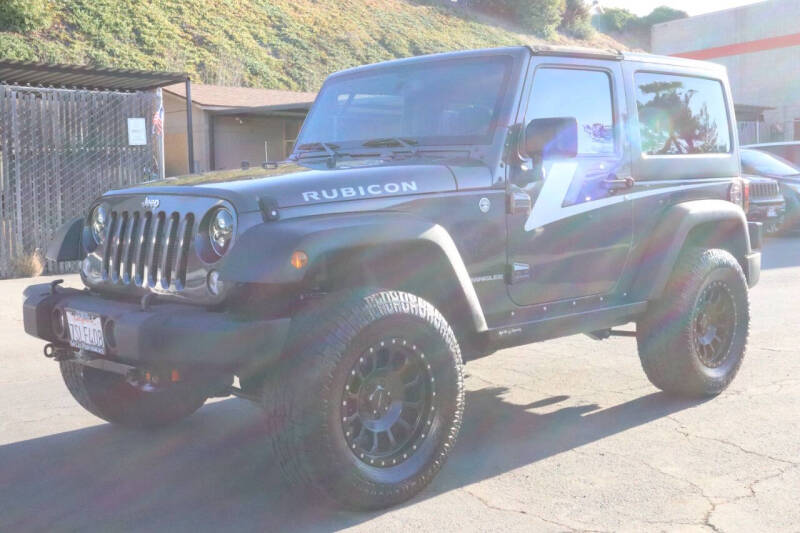 Used 2014 Jeep Wrangler Rubicon with VIN 1C4BJWCG7EL303431 for sale in San Diego, CA