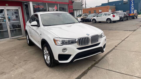 2016 BMW X4 for sale at iDrive Auto Group in Eastpointe MI