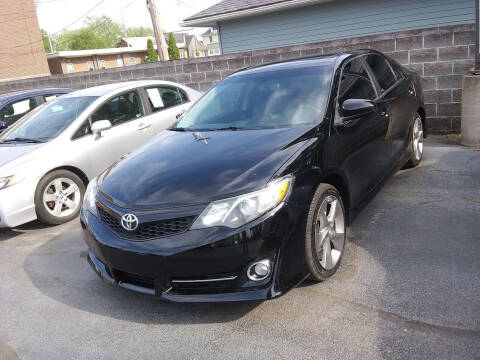 2013 Toyota Camry for sale at Village Auto Outlet in Milan IL