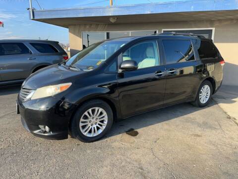 2011 Toyota Sienna for sale at AUTO NATIX in Tulare CA