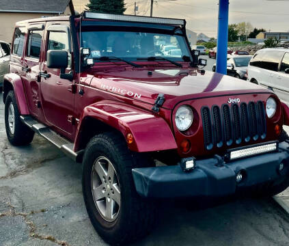 2012 Jeep Wrangler Unlimited for sale at Nelsons Auto Specialists in New Bedford MA