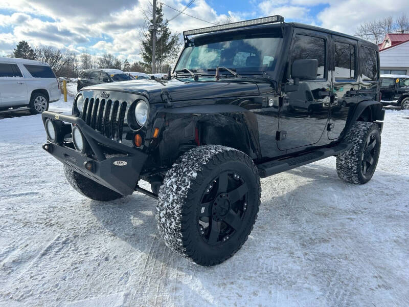 2012 Jeep Wrangler Unlimited for sale at Spooner Auto Sales in Davison MI