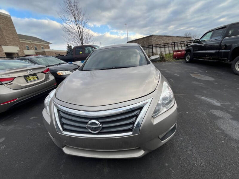 2015 Nissan Altima for sale at ENZO AUTO in Parma OH