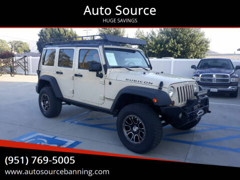 2012 Jeep Wrangler Unlimited for sale at Auto Source in Banning CA