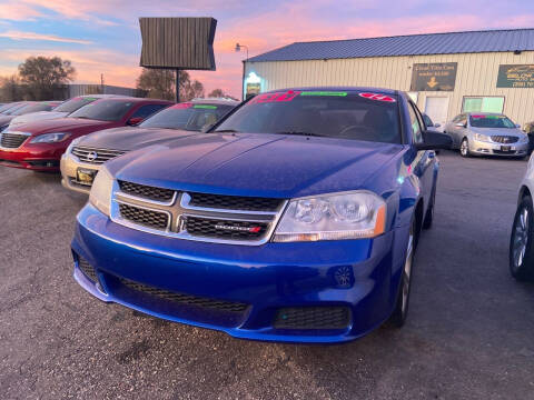 2014 Dodge Avenger for sale at BELOW BOOK AUTO SALES in Idaho Falls ID