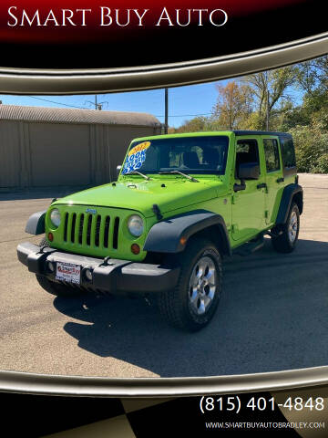 2012 Jeep Wrangler Unlimited for sale at Smart Buy Auto in Bradley IL