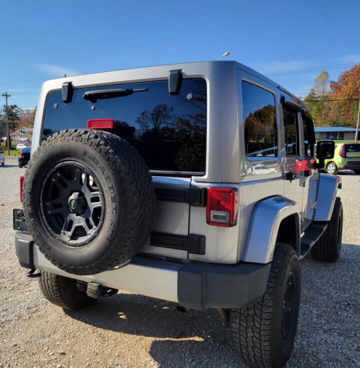 2013 Jeep Wrangler Unlimited for sale at COOPER AUTO SALES in ONEIDA, TN