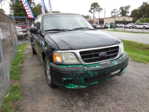 2002 Ford F-150 for sale at SCOTT HARRISON MOTOR CO in Houston TX