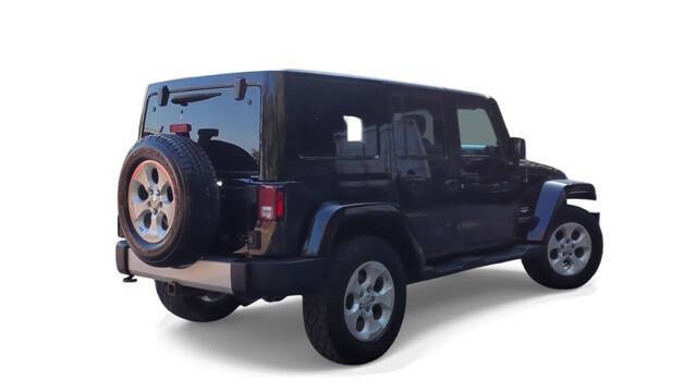 2014 Jeep Wrangler Unlimited for sale at Bowman Auto Center in Clarkston, MI