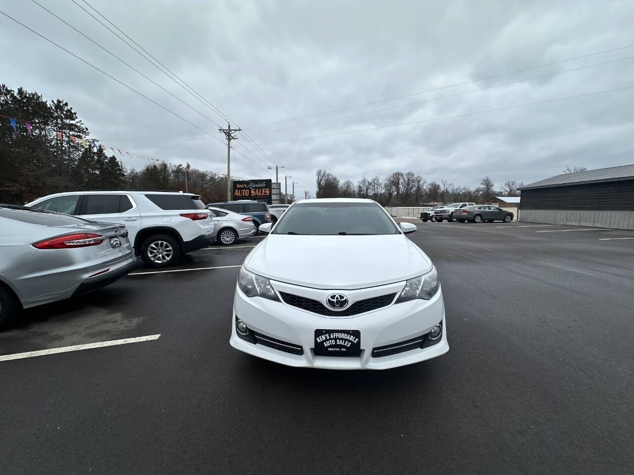 2014 Toyota Camry for sale at Auto Hunter in Webster, WI