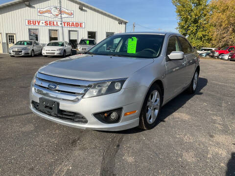 2012 Ford Fusion for sale at Steves Auto Sales in Cambridge MN
