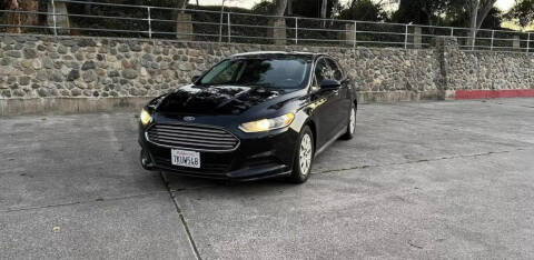 2014 Ford Fusion for sale at WARDS AUTOS LLC in Orange CA