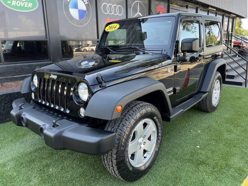 2014 Jeep Wrangler for sale at Cars of Tampa in Tampa FL