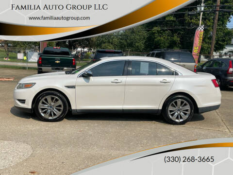 2011 Ford Taurus for sale at Familia Auto Group LLC in Massillon OH
