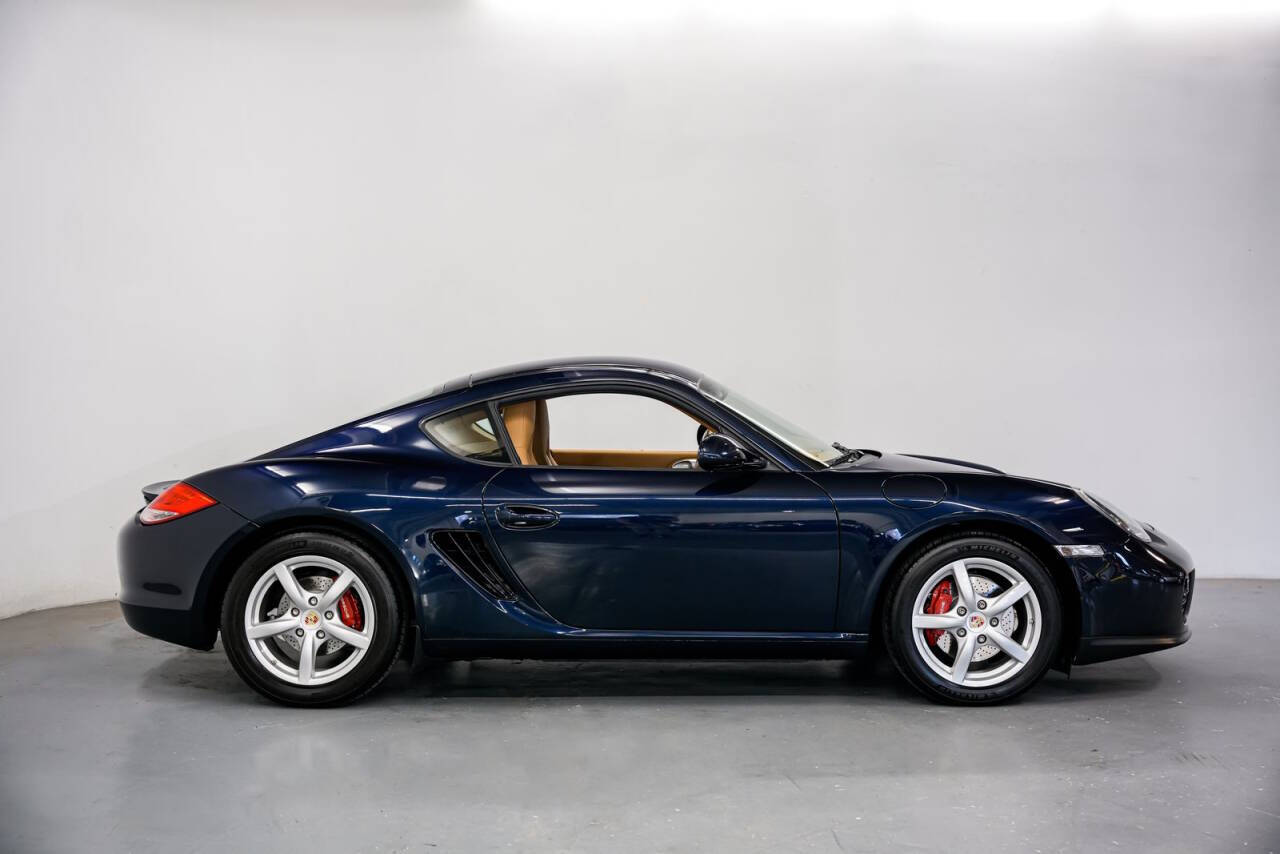 Dk. Blue 2009 Porsche Cayman Base 2dr Coupe 2