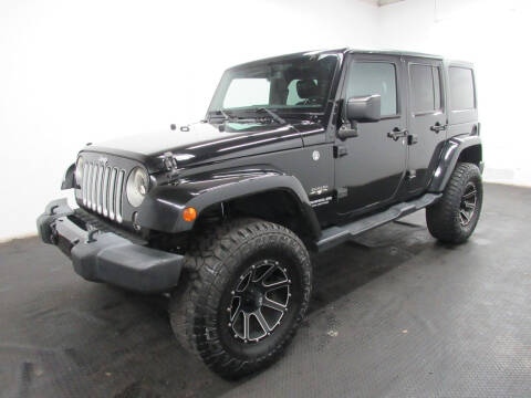2016 Jeep Wrangler Unlimited for sale at Automotive Connection in Fairfield OH