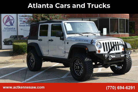2012 Jeep Wrangler Unlimited for sale at Atlanta Cars and Trucks in Kennesaw GA