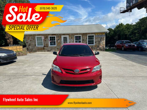 2011 Toyota Corolla for sale at Flywheel Auto Sales Inc in Woodstock GA