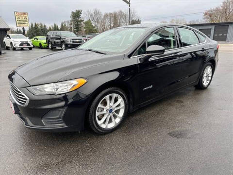 2019 Ford Fusion Hybrid for sale at HUFF AUTO GROUP in Jackson MI