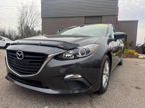 2016 Mazda MAZDA3 for sale at George's Used Cars in Brownstown MI