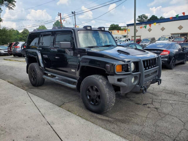 2007 HUMMER H3 for sale at DAGO'S AUTO SALES LLC in Dalton, GA