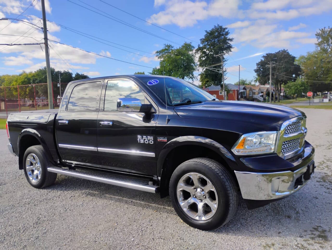 2015 RAM 1500 Laramie 4x4 4dr Crew Cab 5.5 ft. SB Pickup's photo