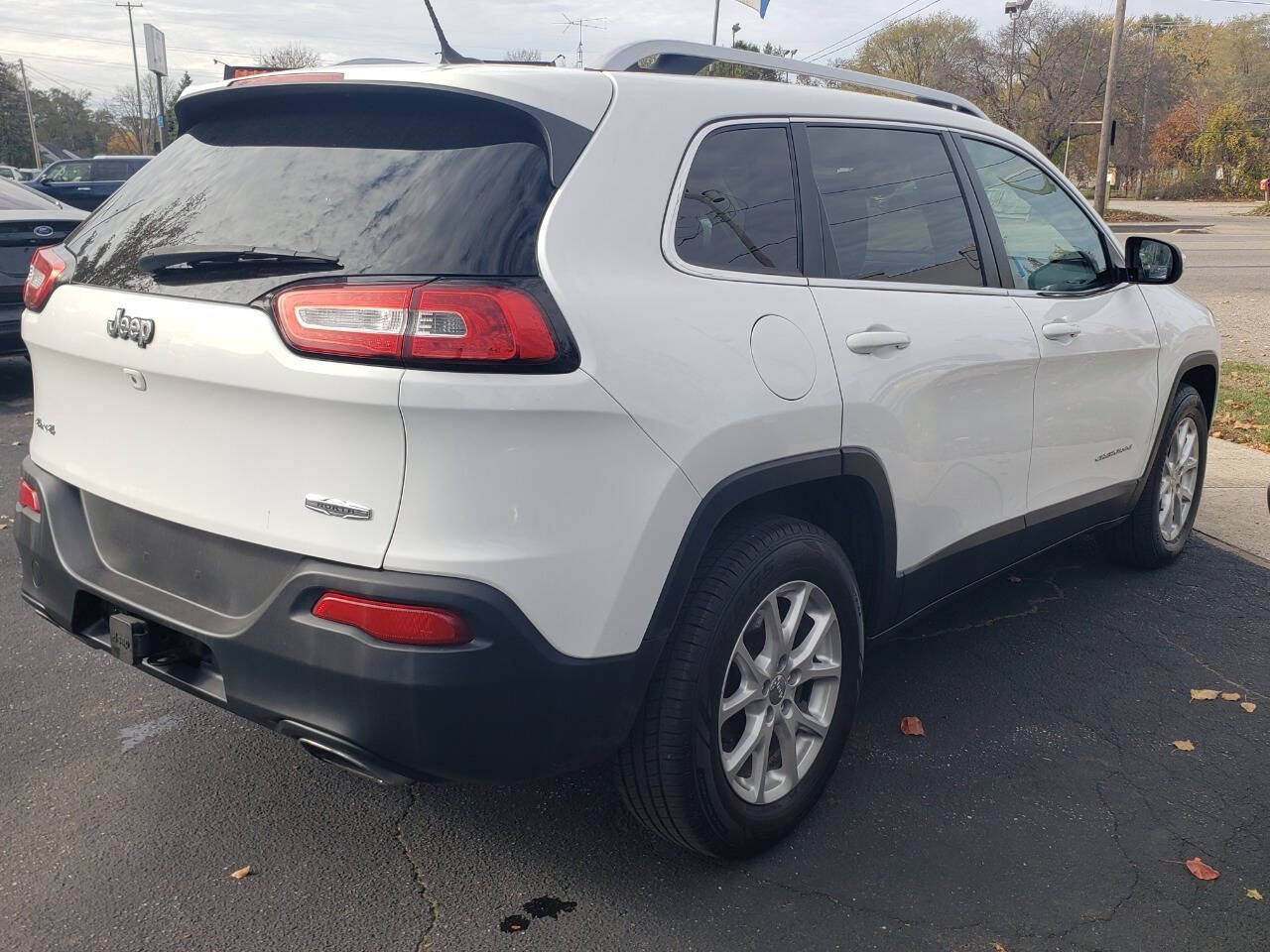 2015 Jeep Cherokee for sale at Auto Shop in Wyoming, MI