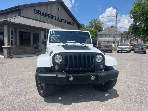 2014 Jeep Wrangler Unlimited for sale at Drapers Auto Sales in Peru IN