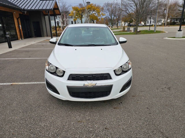 2014 Chevrolet Sonic for sale at WAGNER AUTO MART LLC in Ann Arbor, MI