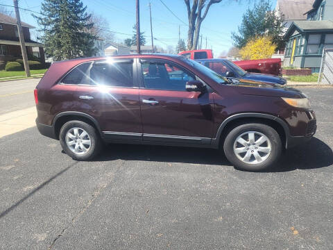 2011 Kia Sorento for sale at Maximum Auto Group II INC in Cortland OH