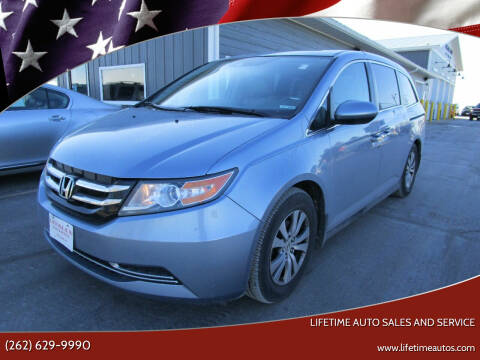 2014 Honda Odyssey for sale at Lifetime Auto Sales and Service in West Bend WI