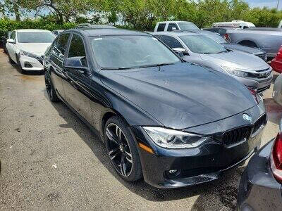 2014 BMW 3 Series for sale at THE SHOWROOM in Miami FL