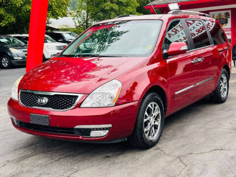 2014 Kia Sedona for sale at HERRERA AUTO SALES LLC in Sugar Hill GA