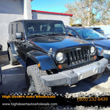 2012 Jeep Wrangler Unlimited for sale at High Desert Auto Wholesale in Albuquerque NM