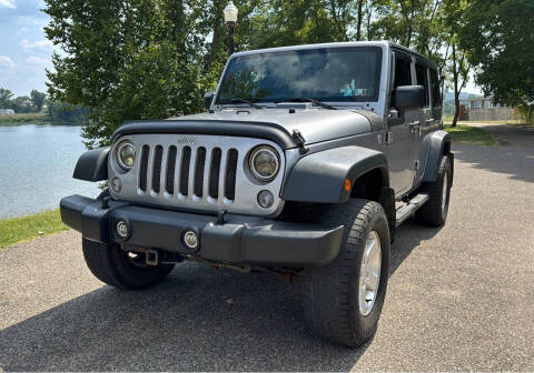 2014 Jeep Wrangler Unlimited for sale at PUTNAM AUTO SALES INC in Marietta OH