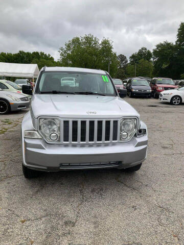 2011 Jeep Liberty for sale at Autocom, LLC in Clayton NC