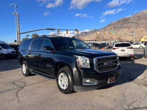 2017 GMC Yukon XL for sale at Revolutionary Auto in Pleasant Grove UT