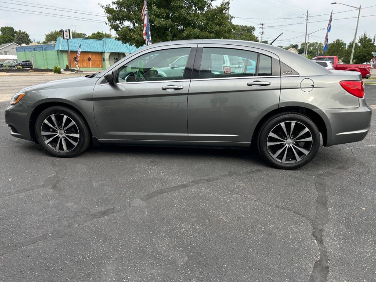 2013 Chrysler 200 for sale at Auto Shop in Wyoming, MI