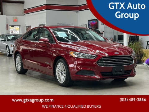 2013 Ford Fusion Hybrid for sale at GTX Auto Group in West Chester OH
