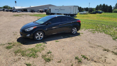 2013 Hyundai Elantra for sale at BERG AUTO MALL & TRUCKING INC in Beresford SD