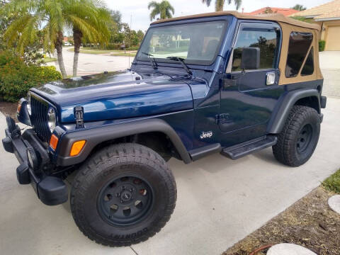 2002 Jeep Wrangler for sale at Noble Auto Sales in Englewood FL