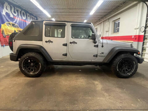 2013 Jeep Wrangler Unlimited for sale at Auto Rite in Bedford Heights OH