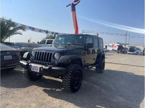 2016 Jeep Wrangler Unlimited for sale at Dealers Choice Inc in Farmersville CA
