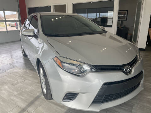 2016 Toyota Corolla for sale at Evolution Autos in Whiteland IN