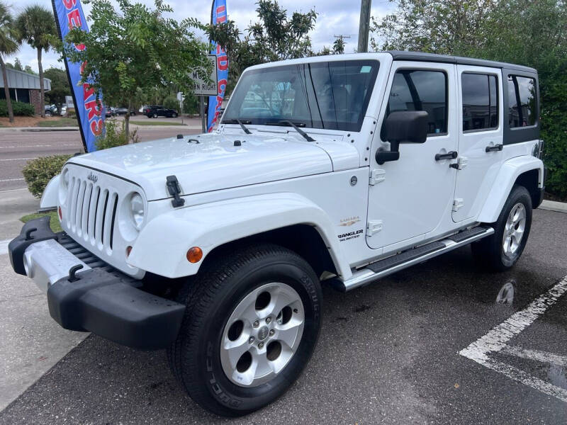 2013 Jeep Wrangler Unlimited for sale at Bay City Autosales in Tampa FL