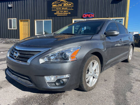 2015 Nissan Altima for sale at BELOW BOOK AUTO SALES in Idaho Falls ID